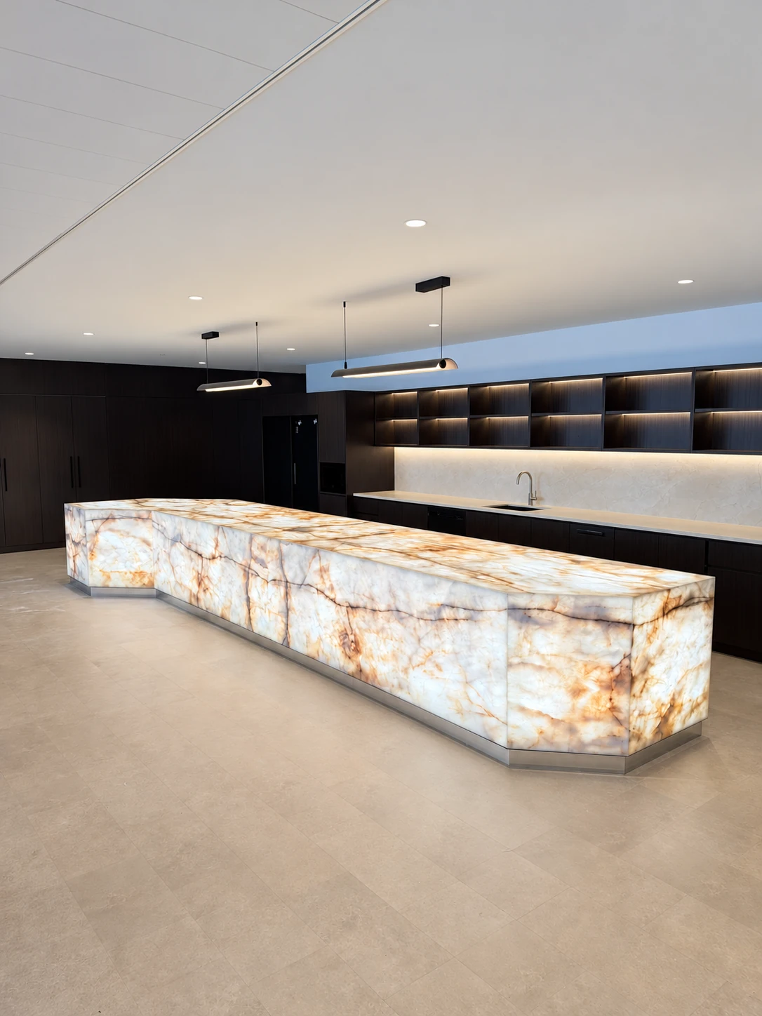Faceted translucent stone island illuminated in soft white light
